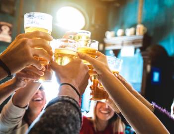 Group cheers with beer glasses